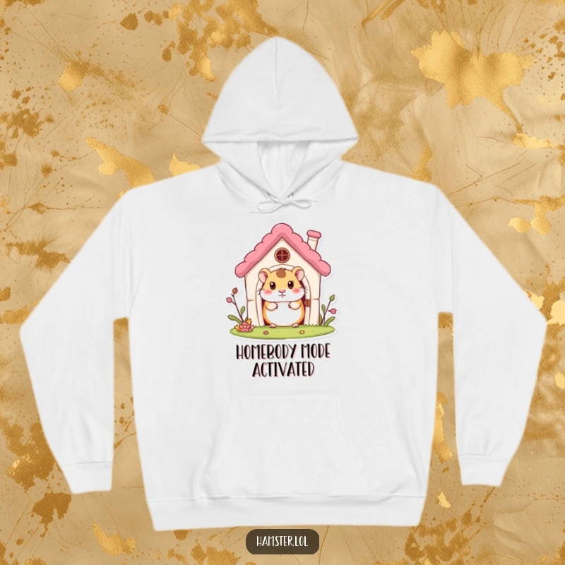 Funny Hoodie: A curious hamster character peeking out from a tiny miniature house, perfect for cozy comfort.