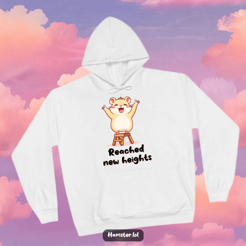 Funny Hoodie: A happy hamster character triumphantly dancing on a tiny ladder, perfect for cozy celebrations.