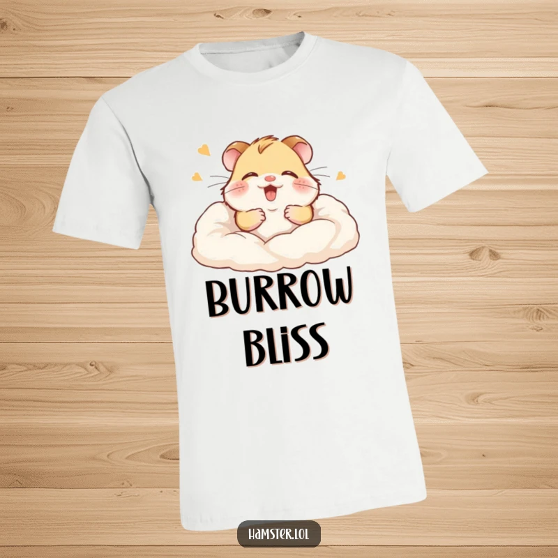 Funny t-shirt depicting a giggling hamster joyfully disappearing into a pile of soft, luxurious bedding.
